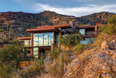 DISCOVER THIS STUNNING ADDRESS, BLENDING A SCENIC .